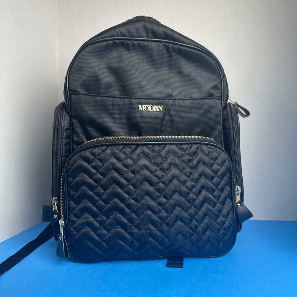 Modrn Jamie Diaper Bag in Black, Adjustable Straps and Changing Pad Included.